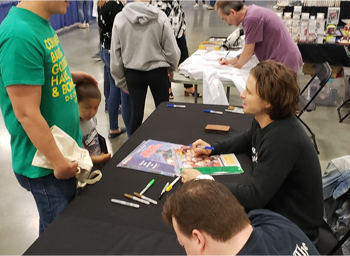 Tamberelli, Henson, Clark & Grant Signing