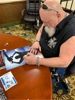 R.A. Milhailoff Signing